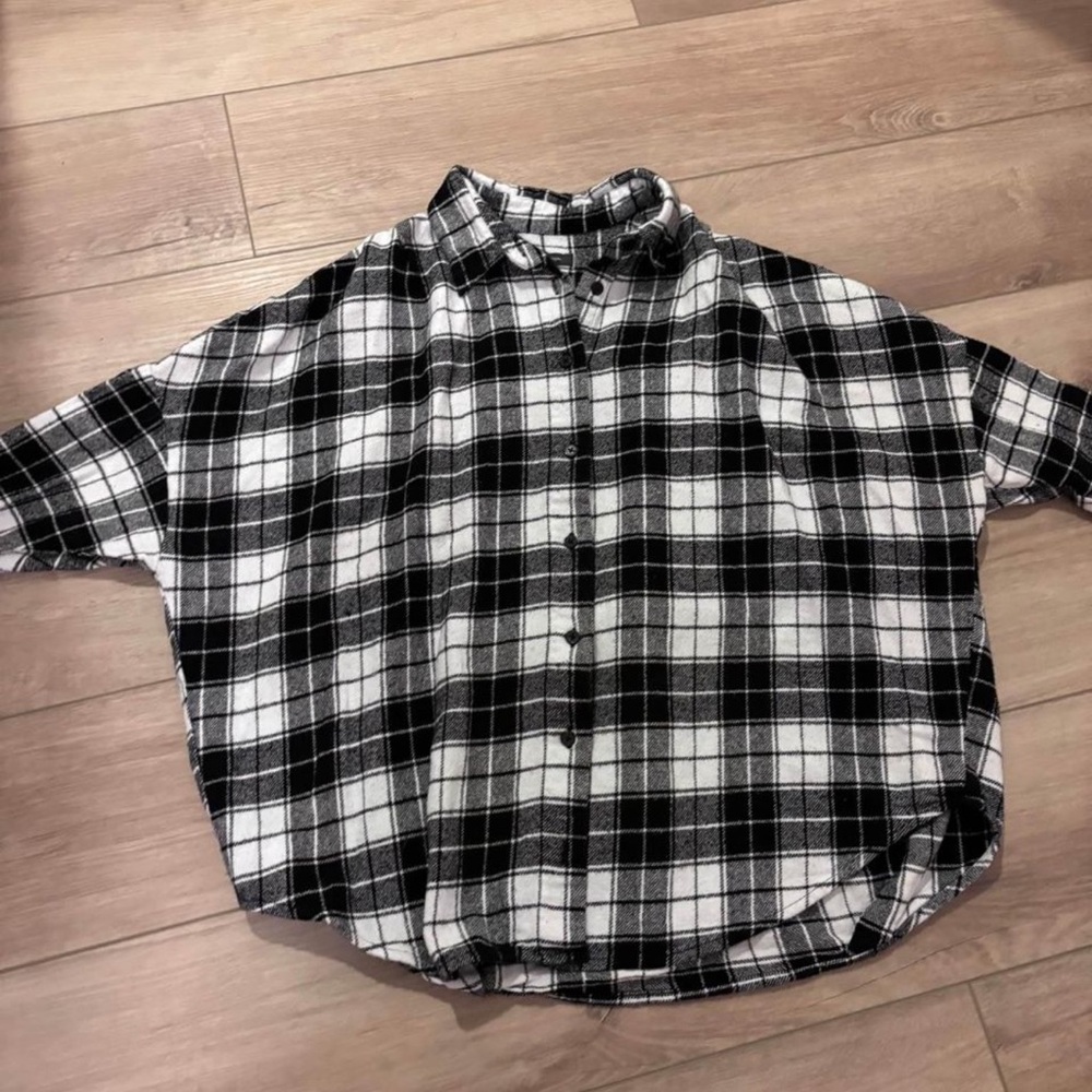 Two medium flannel shirts, both for $15
